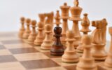 selective focus photography of chess pieces